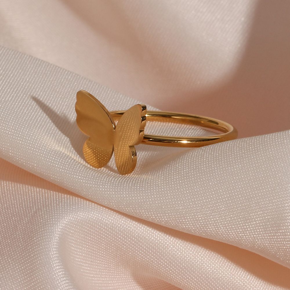 Exquisite Hollow Bow Titanium Steel Plated 18K Gold Ring