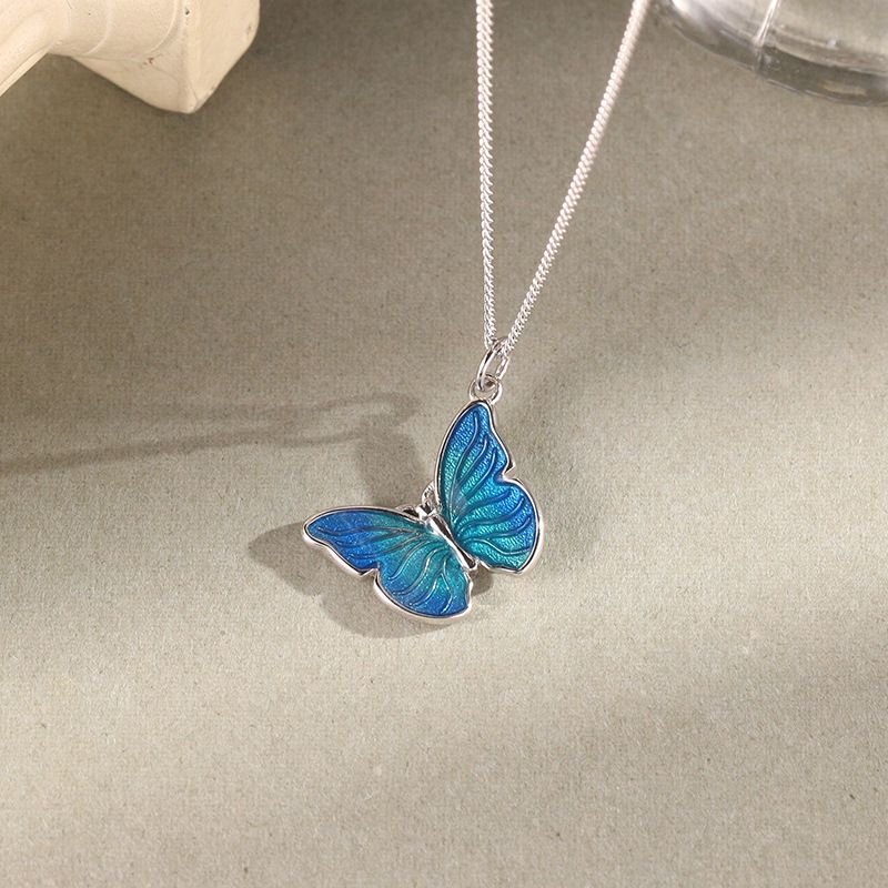 S925 Schmetterling Halskette Sterling Silber Klavierkette Weibliche europäische und amerikanische Nische Ins Temperament Drop Kleber Anhänger