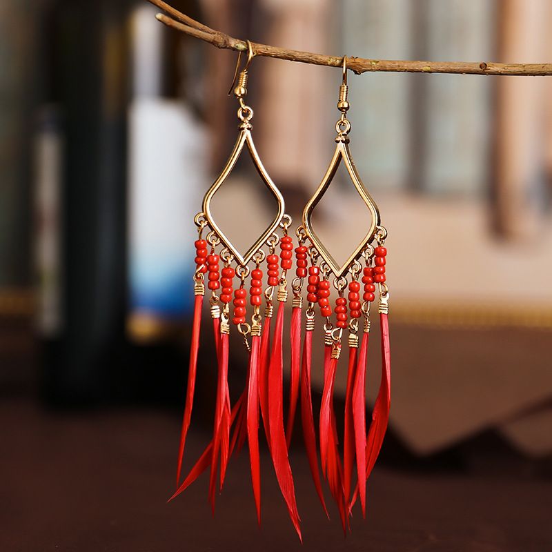 Ornament bunte Perlen Tassel Feder Ohrringe Frauen Böhmischer Stil Grenzüberschreitende Ohrringe Europäische und amerikanische Schmuck
