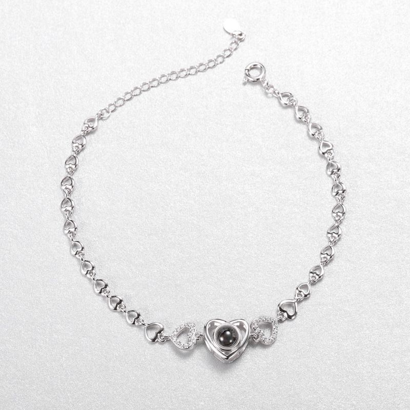 Frauen Hollow Herz Projektion Sterling Silber Armband