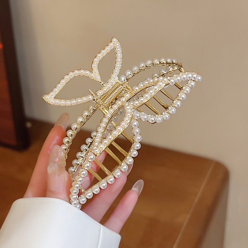 Frauen neue Temperament Pearl Butterfly Clip