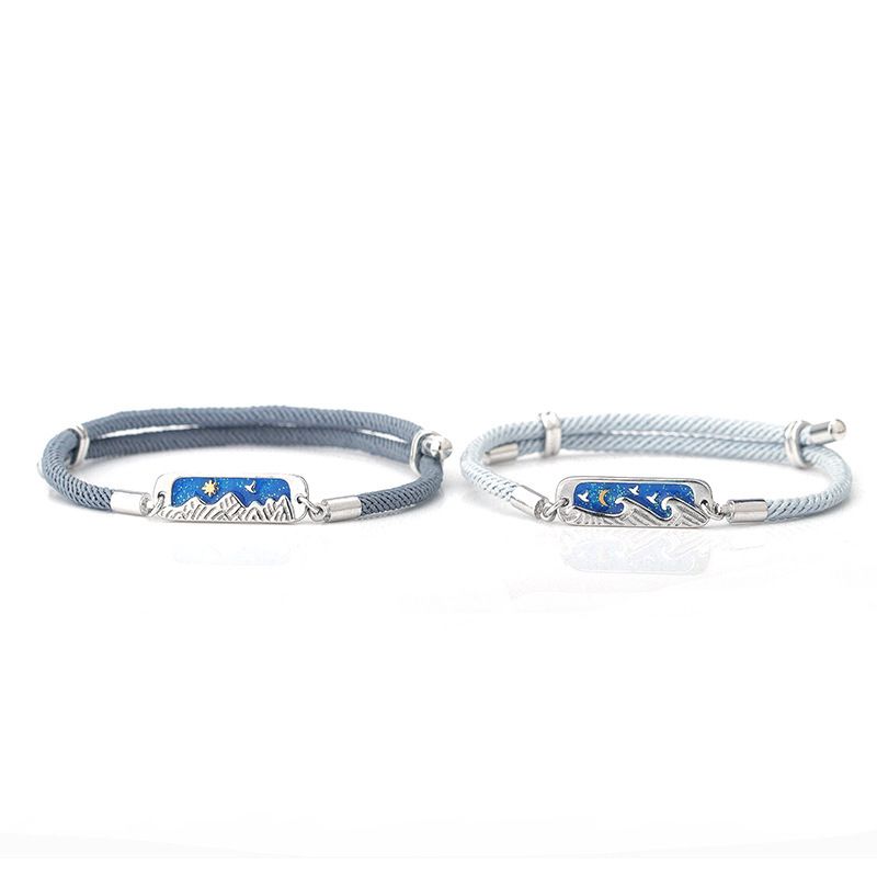 Neues Paar Armband blauer Kleber Drop Telescopic Push Pull