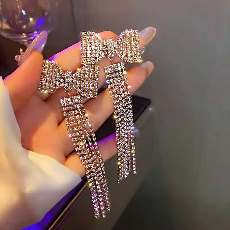 Europäische und amerikanische übertriebenen langen vollen Diamanten Bogen Tassel Ohrringe neue trendige elegante High Sense Eleganz Ohrringe Ohrringe für Frauen