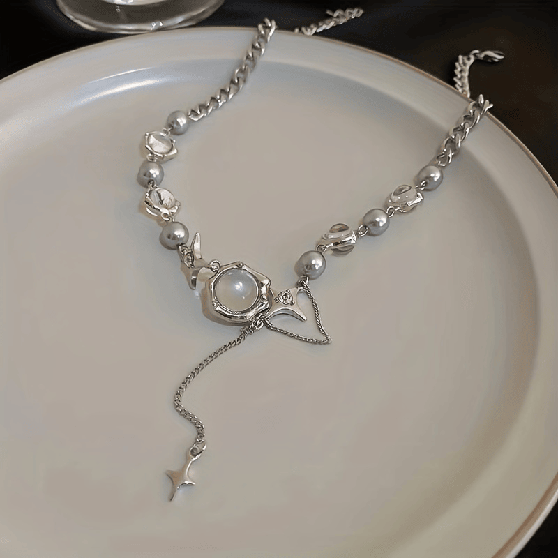 Fügen Sie Ihrem Look einen Hauch von Y2K und Hip Hop-Stil mit unserem Moonlight Zircon Cross Tassel-Halsband hinzu - perfekt für Gelegenheits - und Party-Anlässe!