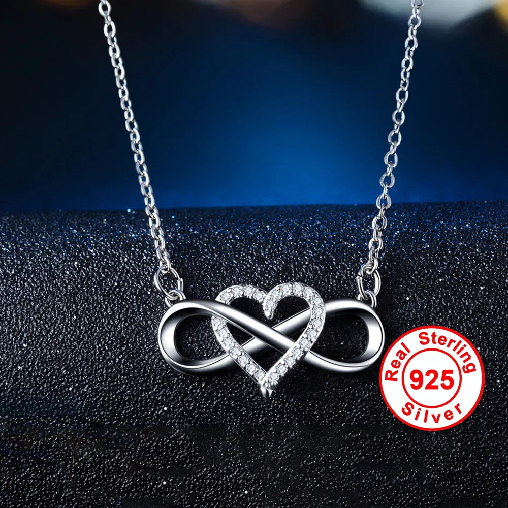 Ein modischer europäischer und amerikanischer 925 Sterling-Silber - Anhänger mit einem herzförmigen Mikro-Einlaid - 8 - Form-Infinity - Mobius-Design, geeignet für den täglichen Tragen und als klassisches Geburtstagsgeschenk