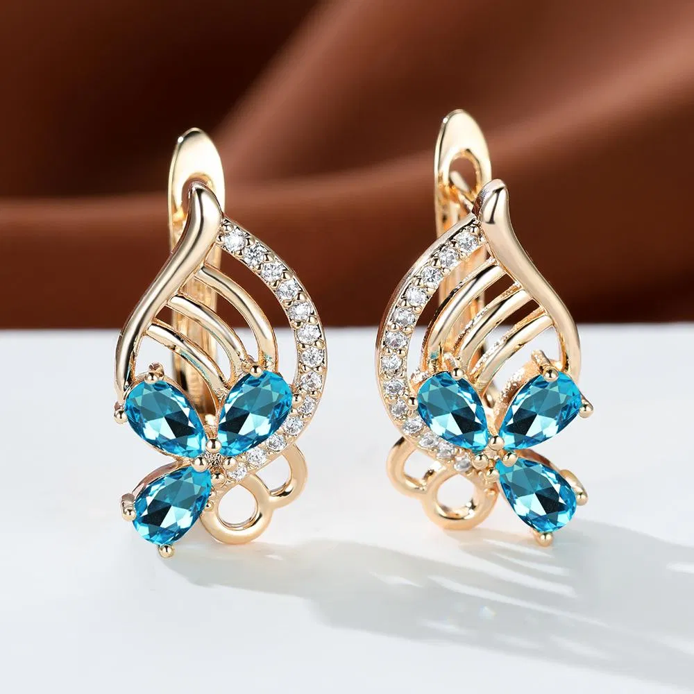 Mode Goldfarbe Schmetterling Hohl Ohrringe für Frauen Tränentropfen Schneiden Aqua Stone Drop Ohrringe Verlobung Geschenke Jubiläumsschmuck