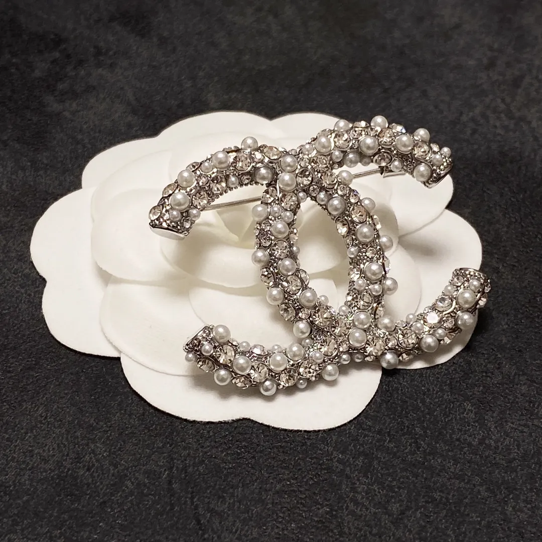 cc Brooch