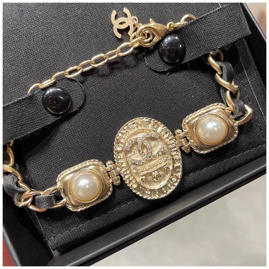 replica Chanel Vintage Light Gold Oval Tag Bracelet - H Lin Jewelry