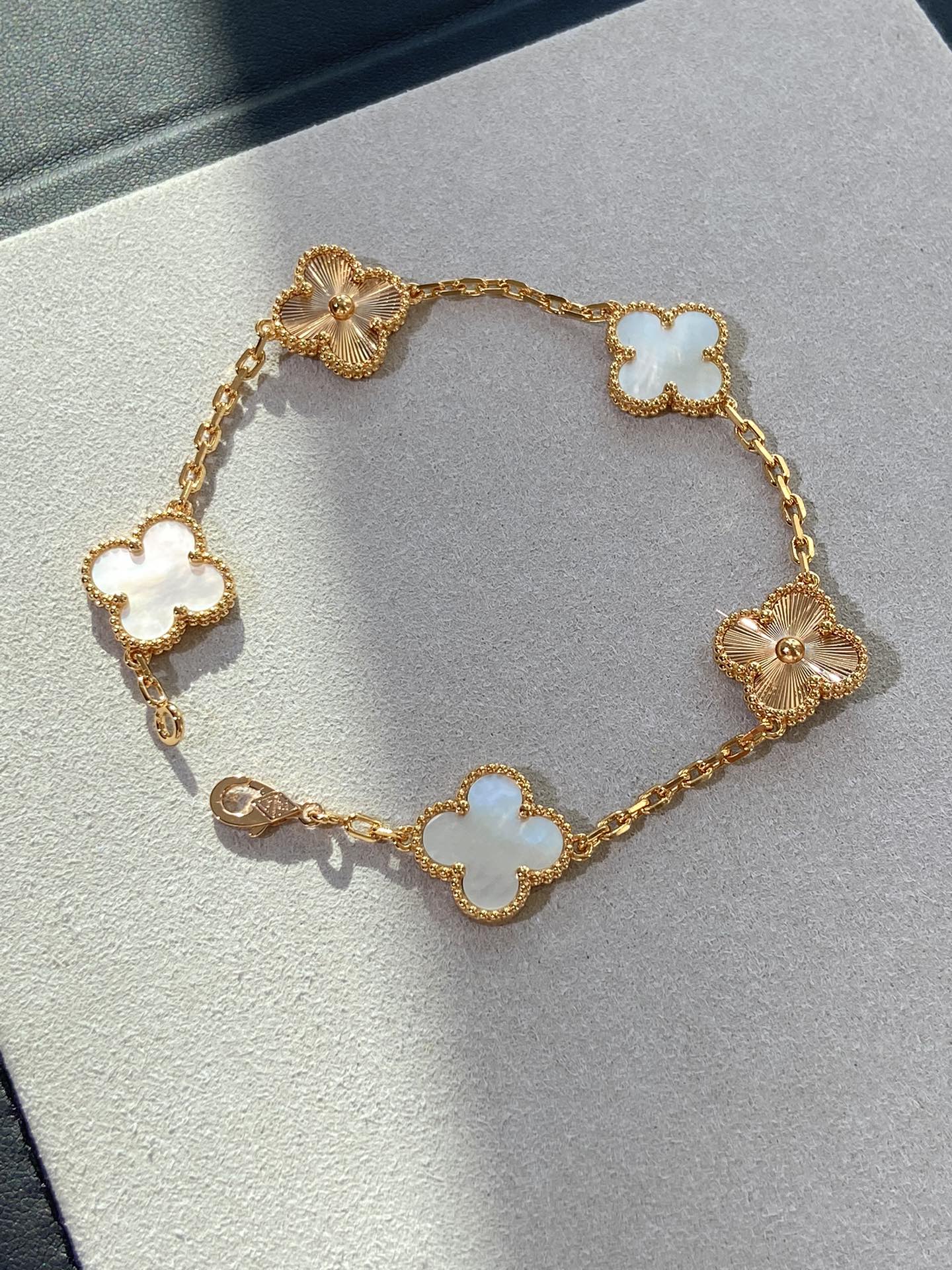 replica Van Cleef & Arpels Vintage Alhambra White and Gold Bracelet 5 Motifs - H Lin Jewelry