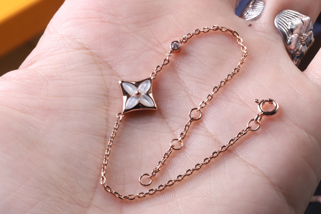 replica Louis Vuitton Minimalist White Mother of Pearl Star Bracelet - H Lin Jewelry