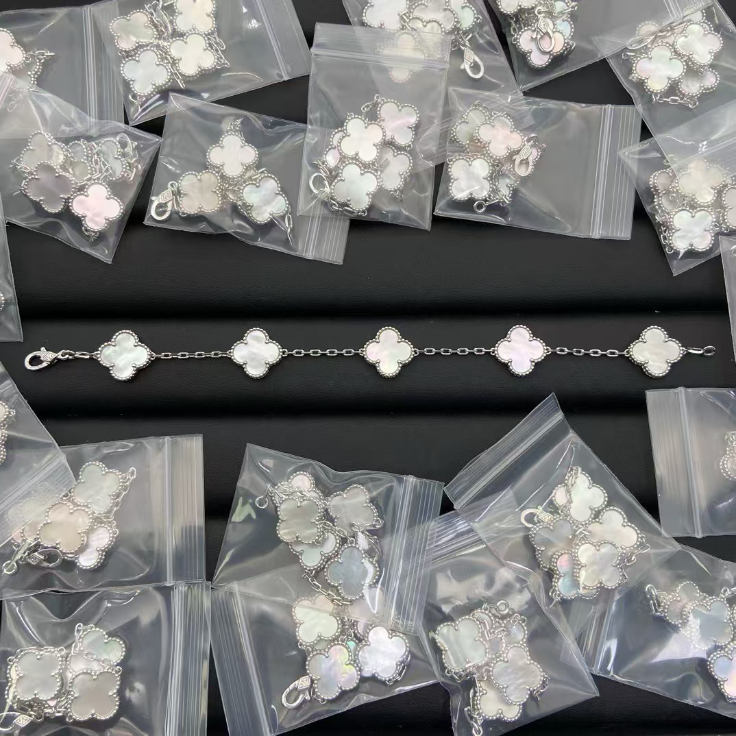 replica Van Cleef & Arpels White Mother of Pearl Vintage Alhambra Bracelet, 5 Motifs - H Lin Jewelry