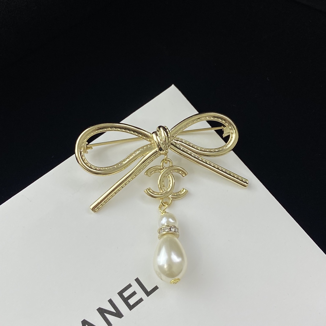 replica Chanel Bow CC Teardrop Pearl Brooch - H Lin Jewelry