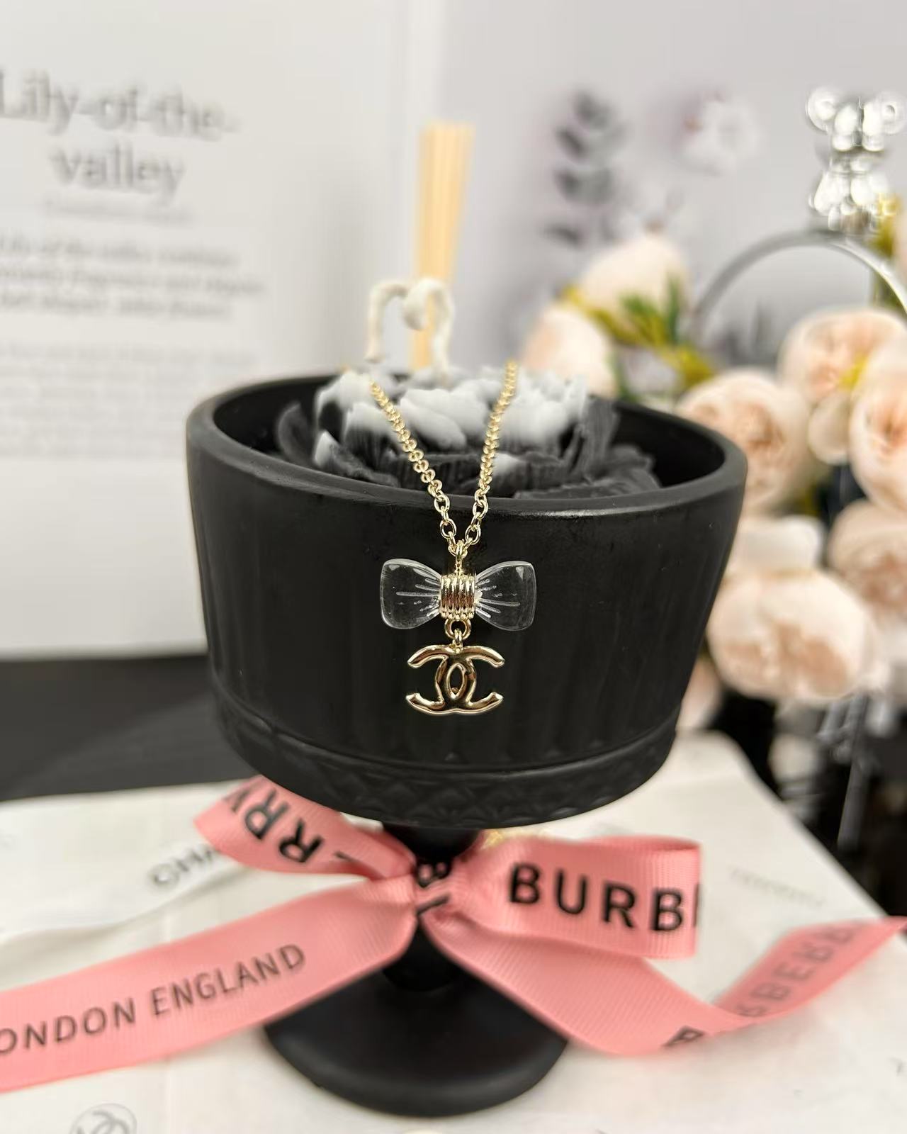 replica Chanel Transparent Bow CC Pendant Necklace - H Lin Jewelry