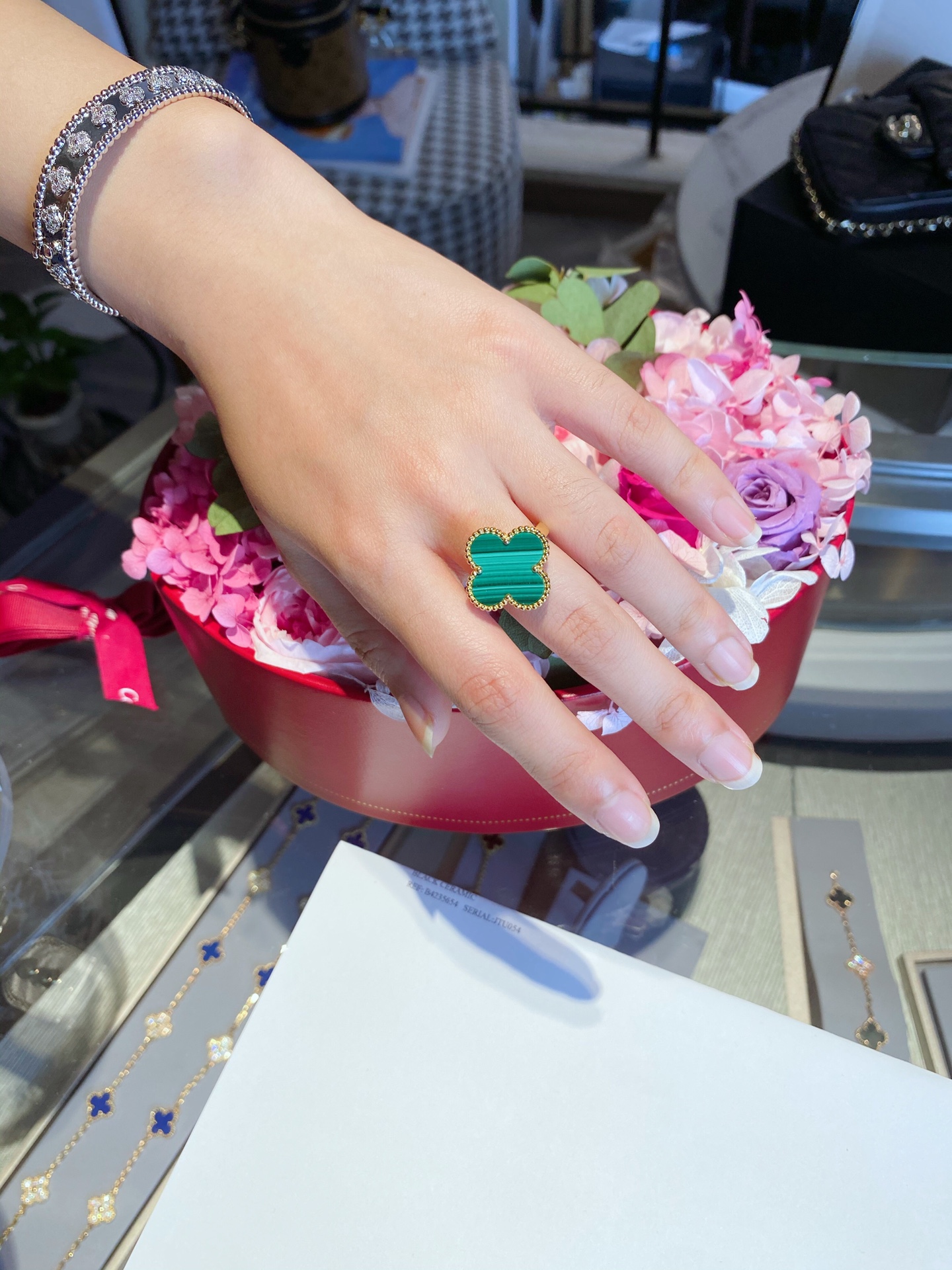 replica Van Cleef & Arpels Green Malachite Magic Alhambra Ring - H Lin Jewelry