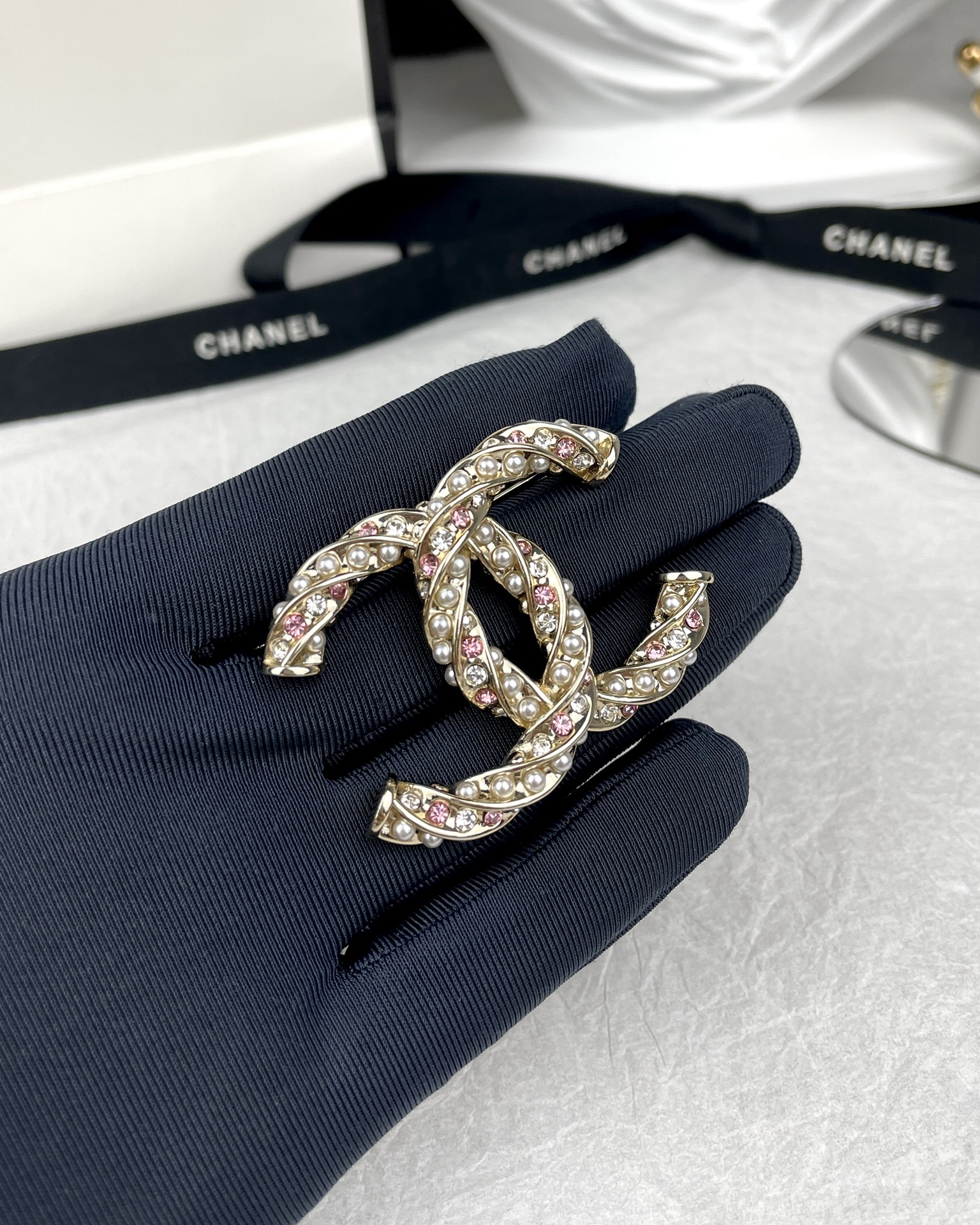 replica Chanel Light Gold Pink Diamond Pearl Twist CC Brooch - H Lin Jewelry