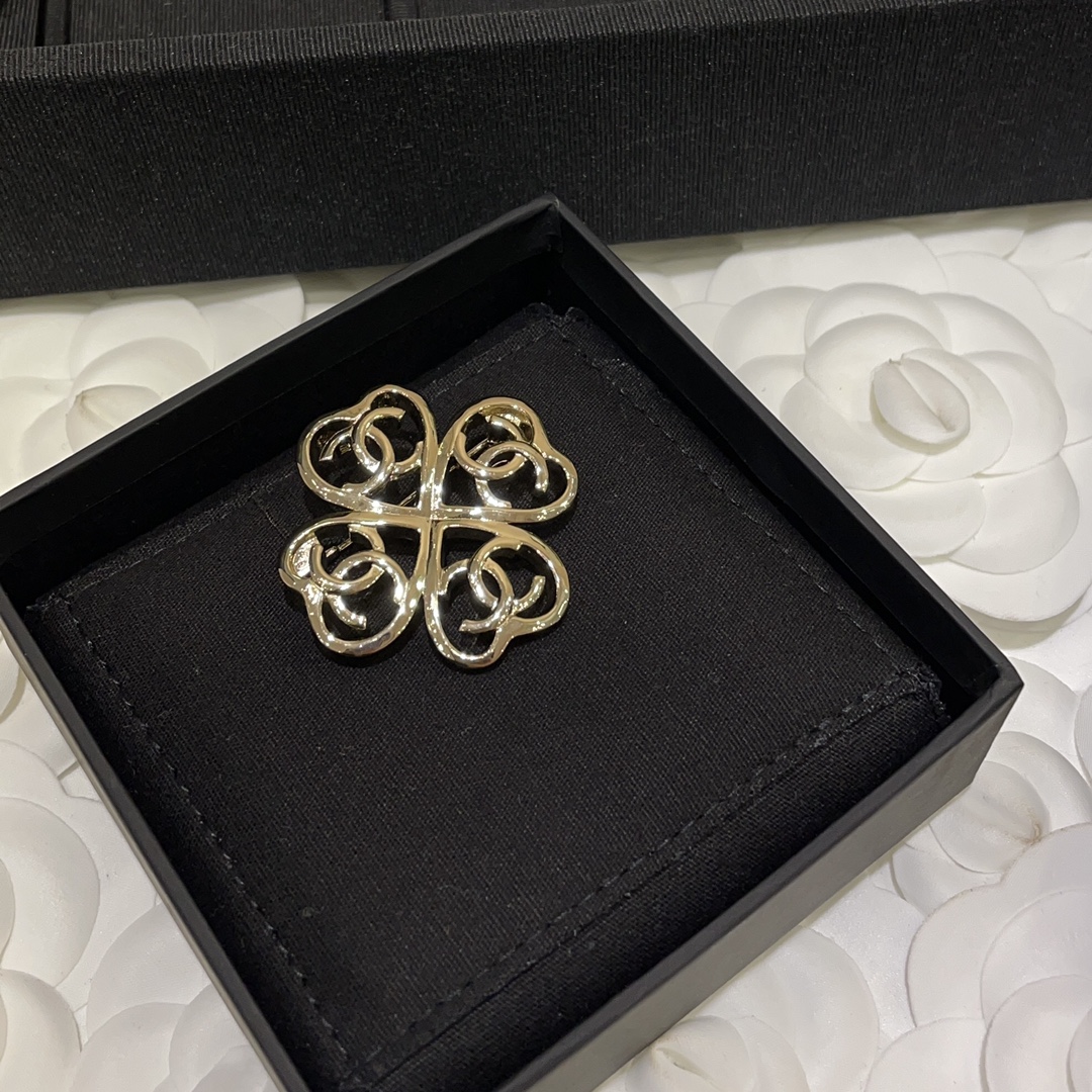 replica Chanel Light Gold Hollow Clover Brooch - H Lin Jewelry