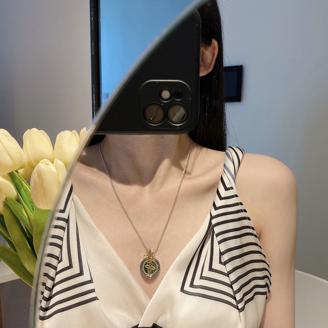 replica Louis Vuitton Two-Sided Silver Gold Round Rotating Pendant Necklace - H Lin Jewelry