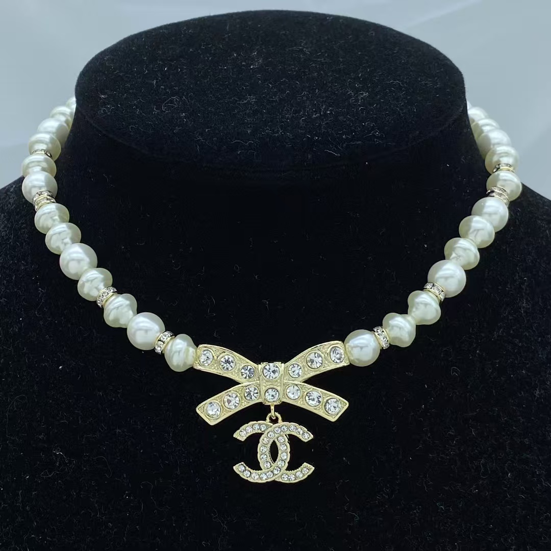 replica Chanel Bowknot Pendant Baroque Pearl Necklace - H Lin Jewelry