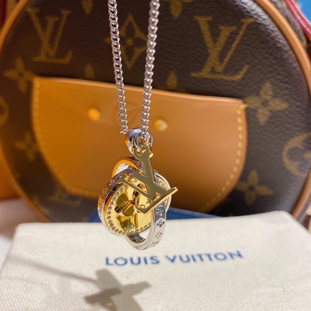 replica Louis Vuitton Two-Sided Silver Gold Round Rotating Pendant Necklace - H Lin Jewelry