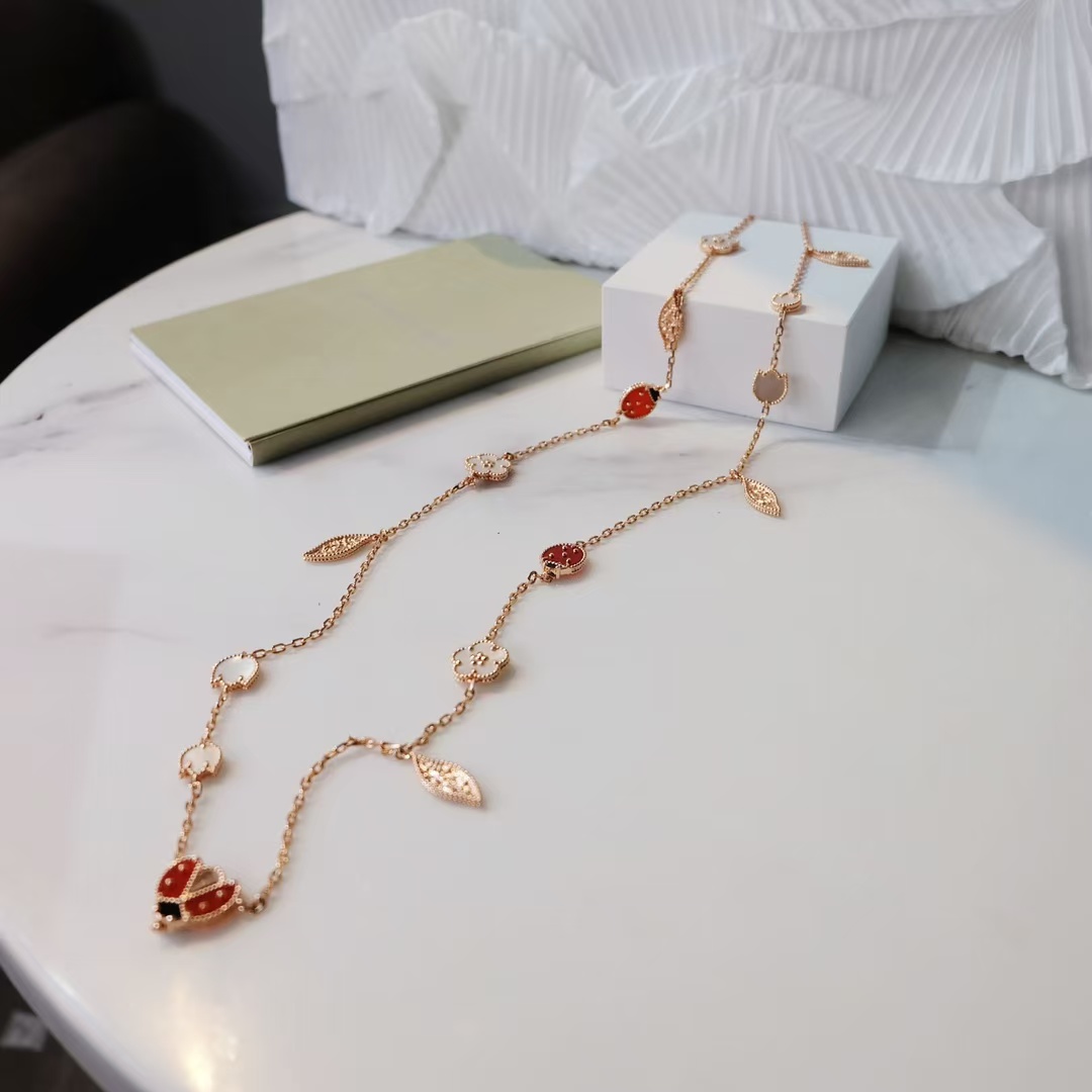 replica Van Cleef & Arpels Lucky Spring Long Necklace, 15 Motifs - H Lin Jewelry
