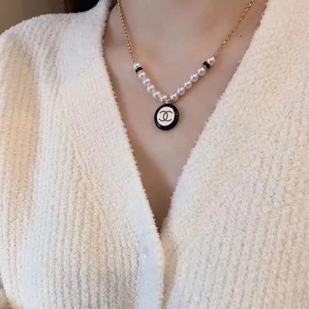 replica Chanel Black and White Round Charm Pearl Bracelet Necklace - H Lin Jewelry