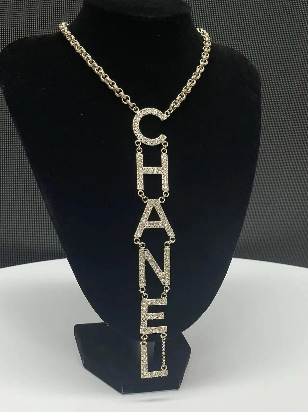 replica Chanel Light Gold Monogram Logo Drop Pendant Necklace - H Lin Jewelry