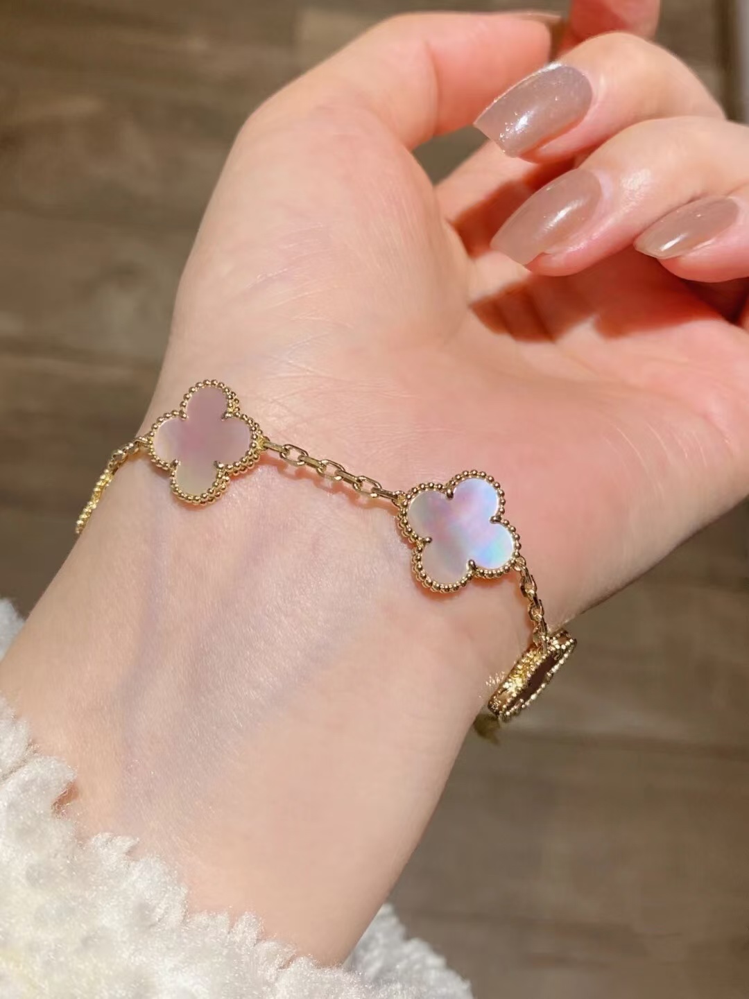 replica Van Cleef & Arpels Natural Pink Mother of Pearl Vintage Alhambra Bracelet, 5 Motifs - H Lin Jewelry
