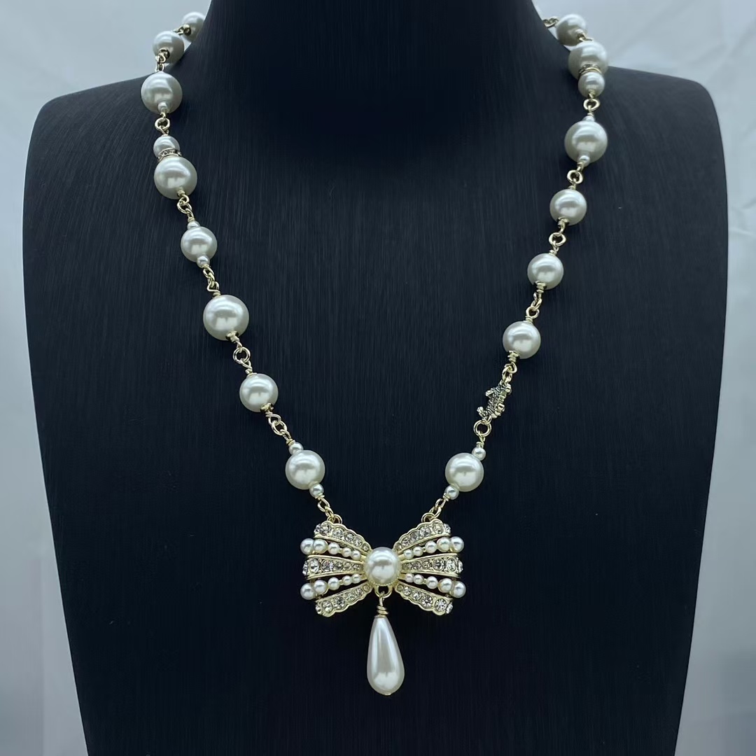 replica Chanel Sweet Bowknot with Teardrop Pearl Pendant Necklace - H Lin Jewelry