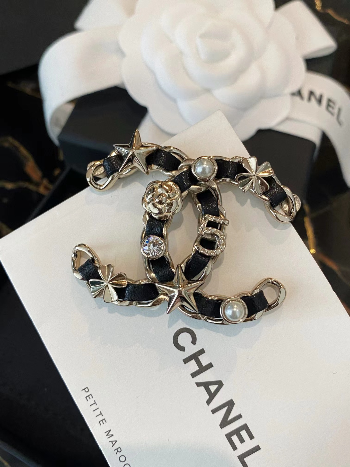 replica Chanel Star Leather Wrap Gold CC Brooch - H Lin Jewelry