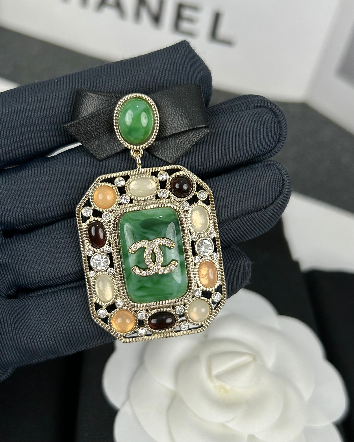 replica Chanel Leather Bow Multigem Emerald Brooch - H Lin Jewelry