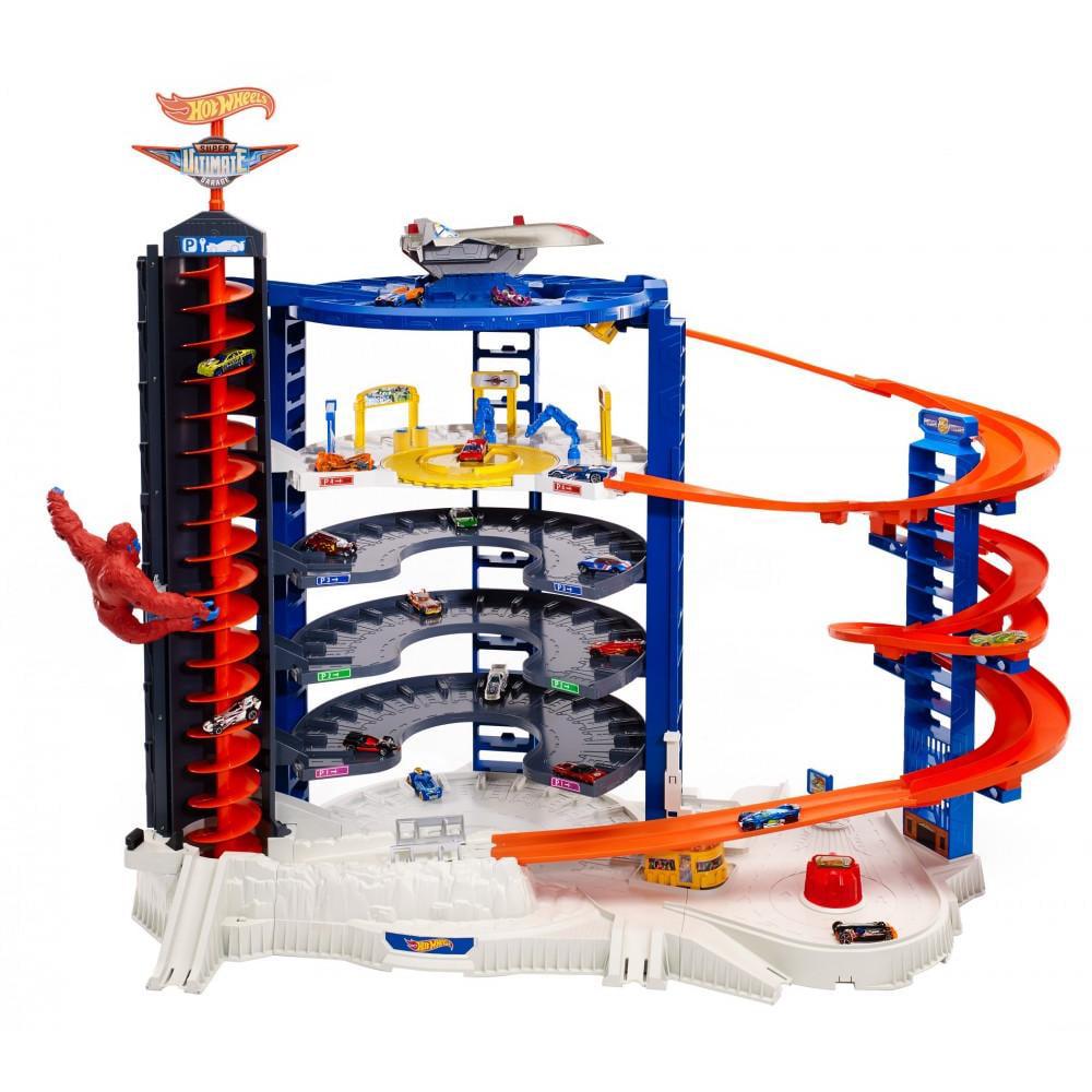 Hot Wheels Track Set with 4 1:64 Scale Toy Cars, Super Ultimate Garage, Over 3-Feet Tall