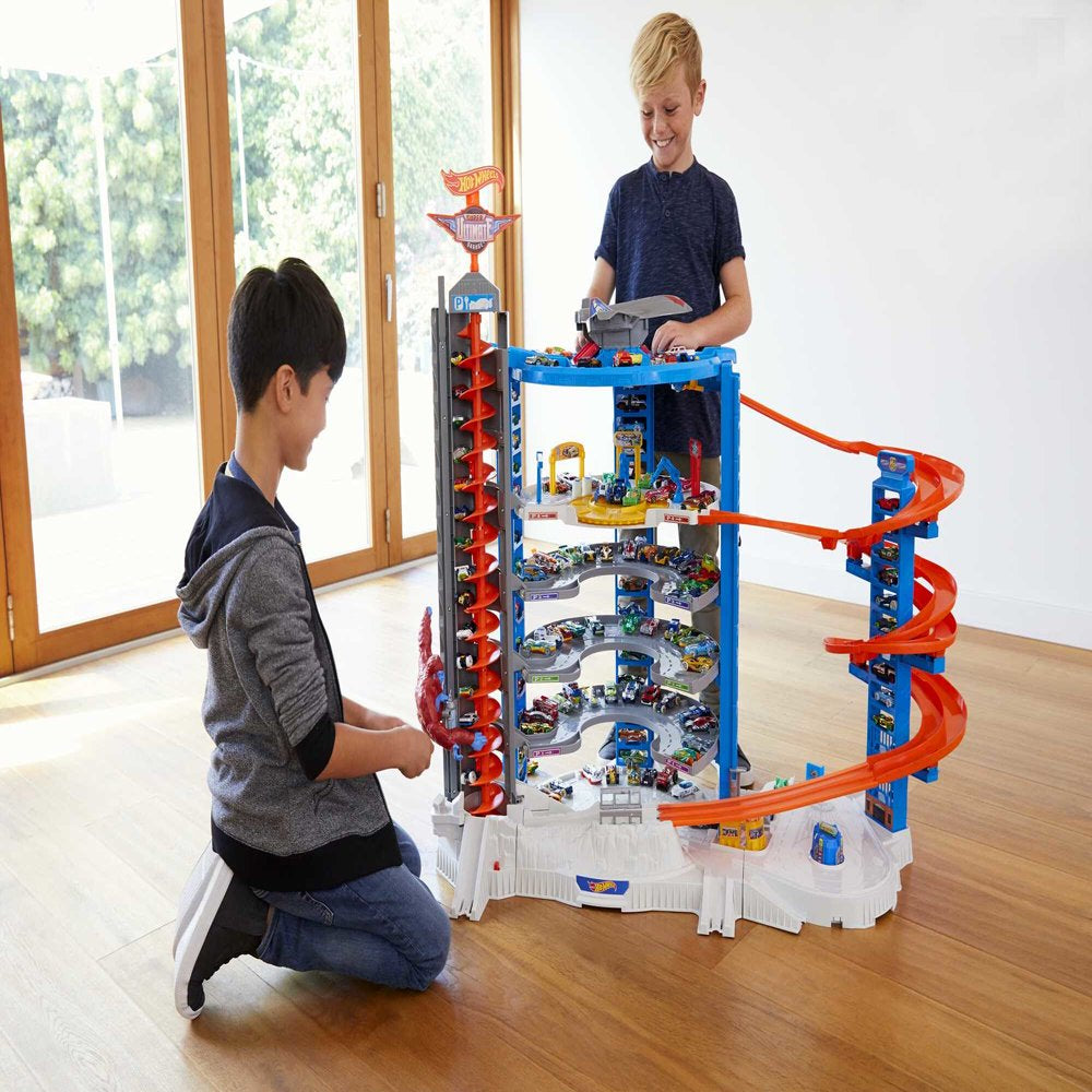 Hot Wheels Super Ultimate Garage Track Set with 4 Cars & Jet Plane, Over 3ft Tall, 140+ Car Storage, Motorized Elevator