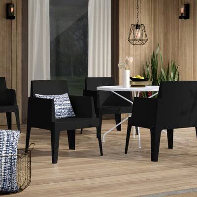 Bence Stacking Patio Dining Armchair Mercury Row Color: Black