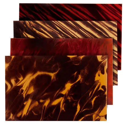 Tortoloid Pickguard Material, Red Swirl from StewMac. StewMac Luthier Tools + Supplies