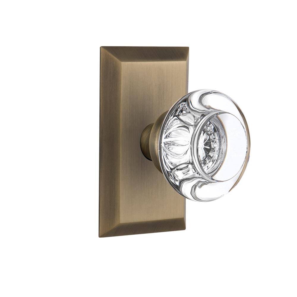 Nostalgic Warehouse 717812 Studio Plate Privacy Round Clear Crystal Glass Door Knob, Antique Brass