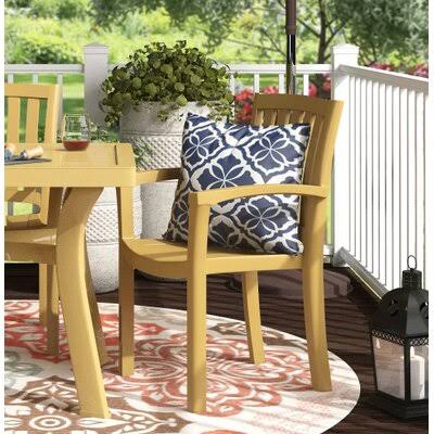 Accomac Stacking Patio Dining Armchair (Set of 4) Mistana Color: Teak