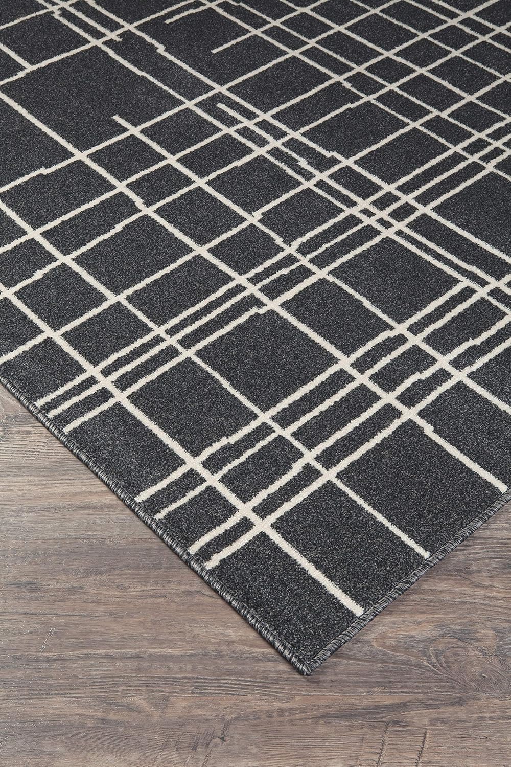 Signature Design by Ashley Jai Spindled Cross Hatch 5 x 7 ft Medium Pile Rug, Black & White