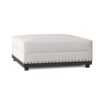 Alexie Ottoman Red Barrel Studio Body Fabric: Sachi White, Leg Color: Briar Smoke