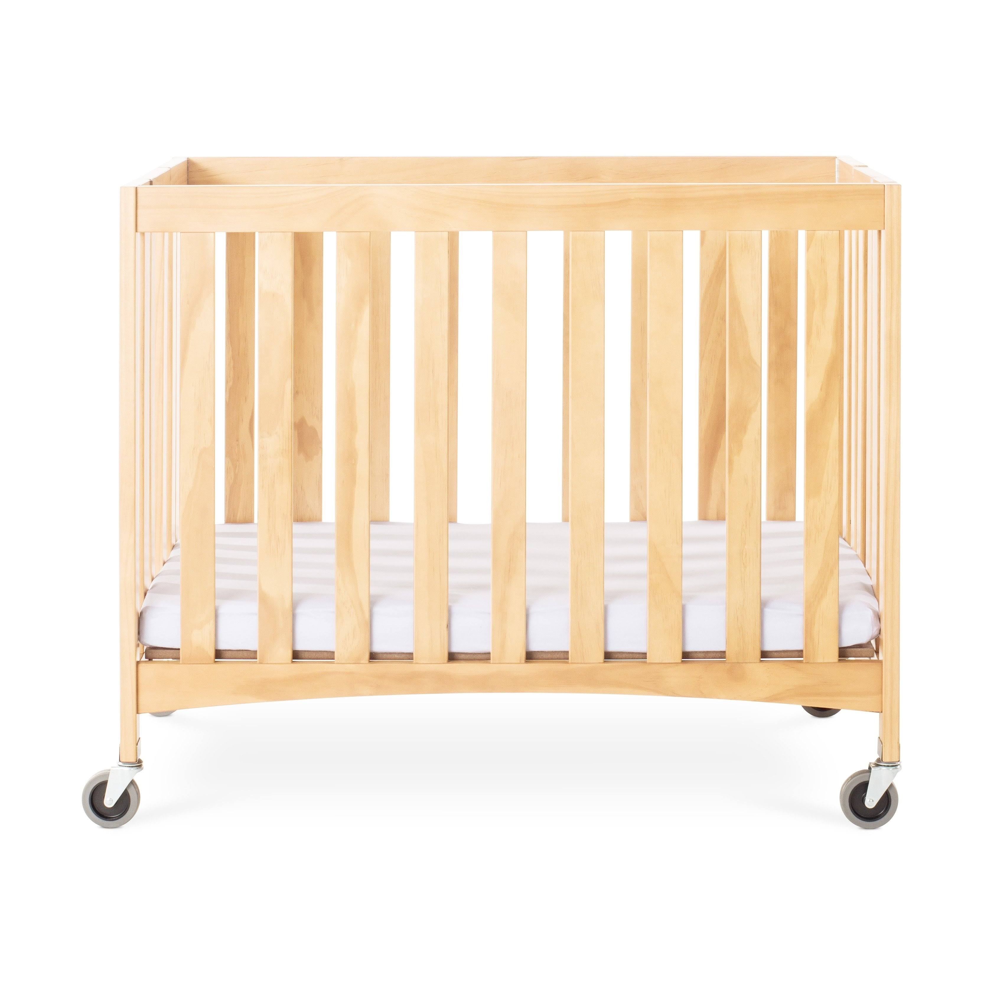 Foundations Travel Sleeper Wood Folding Compact Crib with 2x22 Foam Mattress