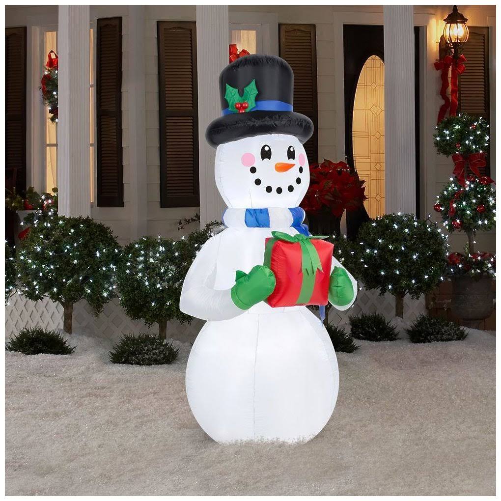 Home Accents Holiday 6.6 ft. H Inflatable Snowman with Present Gift Box