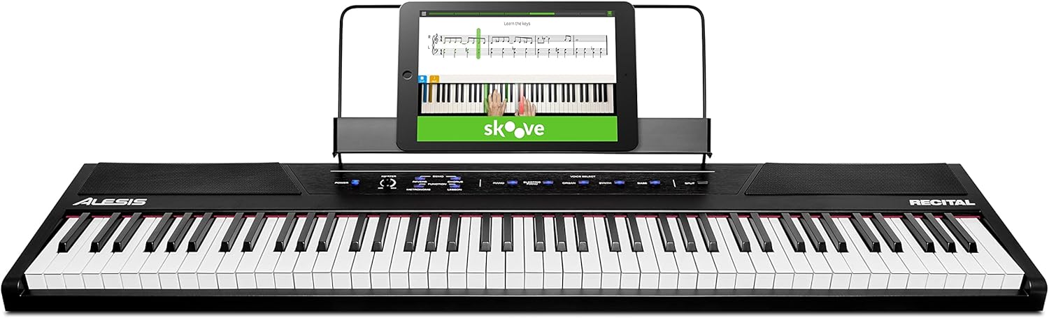 Alesis Recital – 88 Key Digital Piano Keyboard with Semi Weighted Keys & RockJam Compact 61 Key Keyboard with Sheet Music Stand, Power Supply, Piano Note Stickers & Simply Piano Lessons