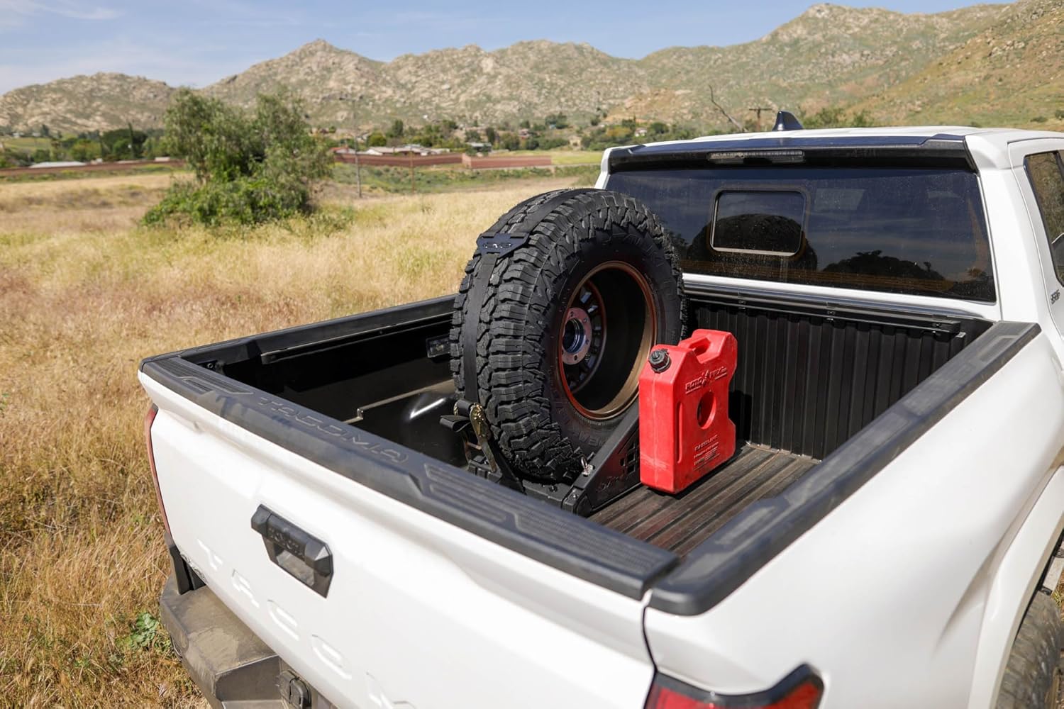 DV8 Offroad Truck Bed Universal Tire Carrier & Accessory Mount | Featured Side Molle Panels for Mounting Gear & Supplies | Adjustable for Carrying Various Sized Tires and Bikes | Powder Coated Finish