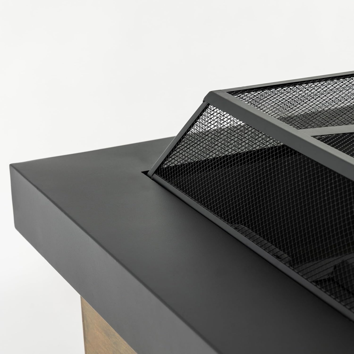 Black 36x24 inch Steel Fire Pit Table with Woven Pattern Detailing Durable Construction for All Weather Wood Burning Enjoyment